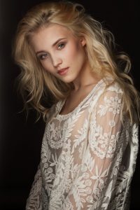 Studio portrait of a beautiful young blond woman
